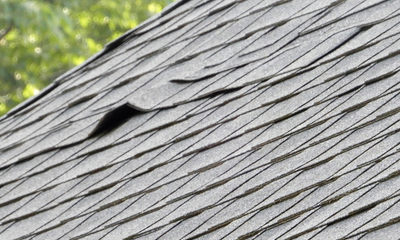 Buckling roof shingles, for information on roof repair from Thurston Roof with services in Raleigh, Clayton, Durham and surrounding areas