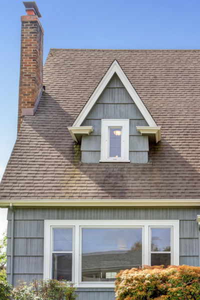 A rooftop seam and shingles, for information on Clayton Roofing from Thurston Roof